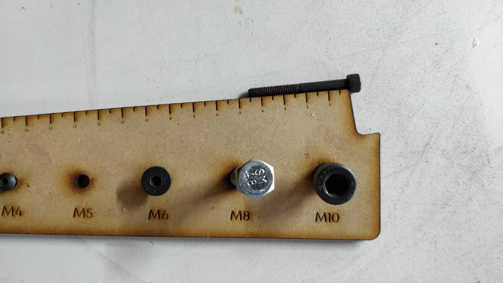 Etched ruler for bolt length