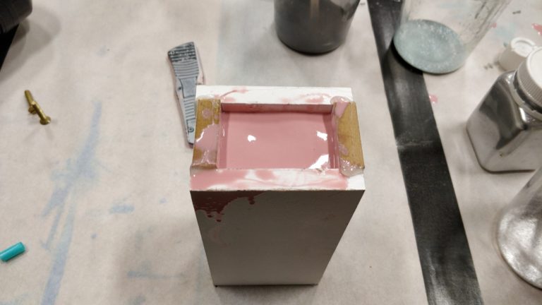 Poured silicone in to fill entire box