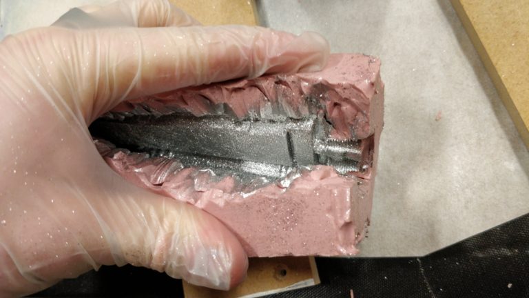 Mold coated in metal powder