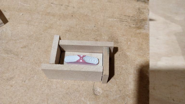 Button in mold box