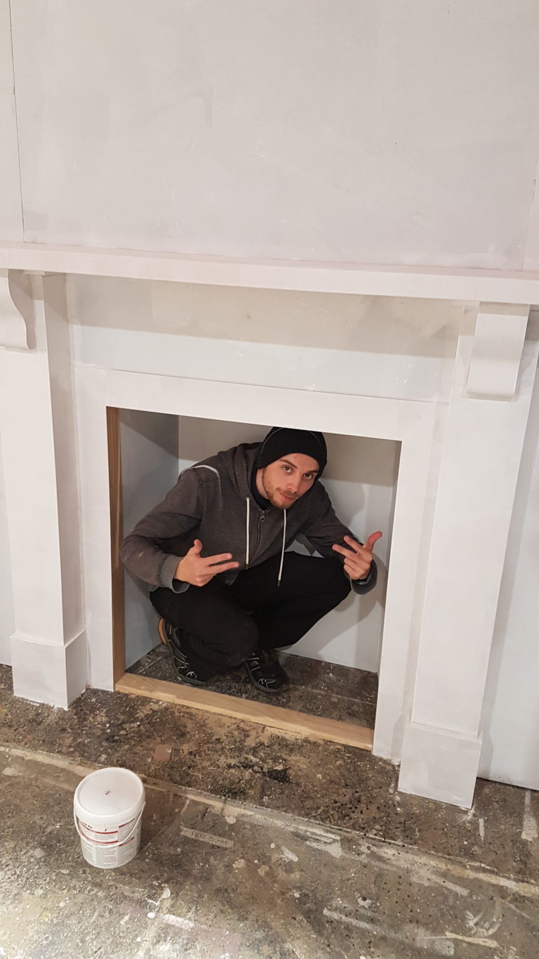 Ben inside the fireplace