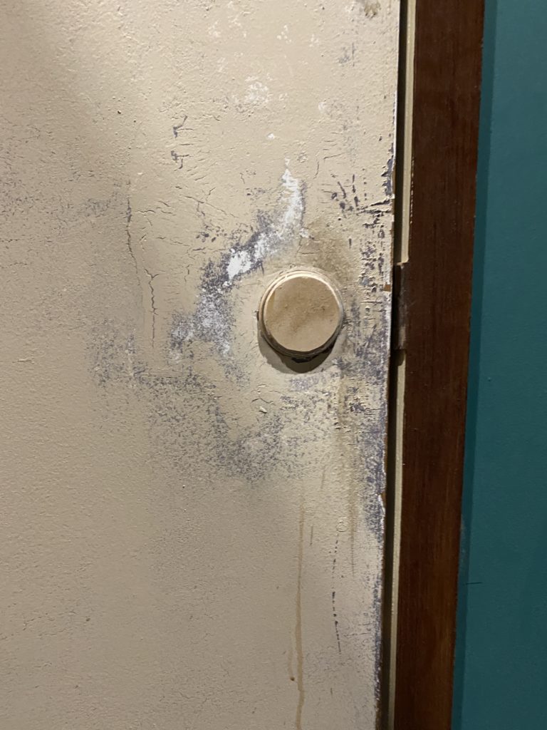 Placement for door handle to "basement"