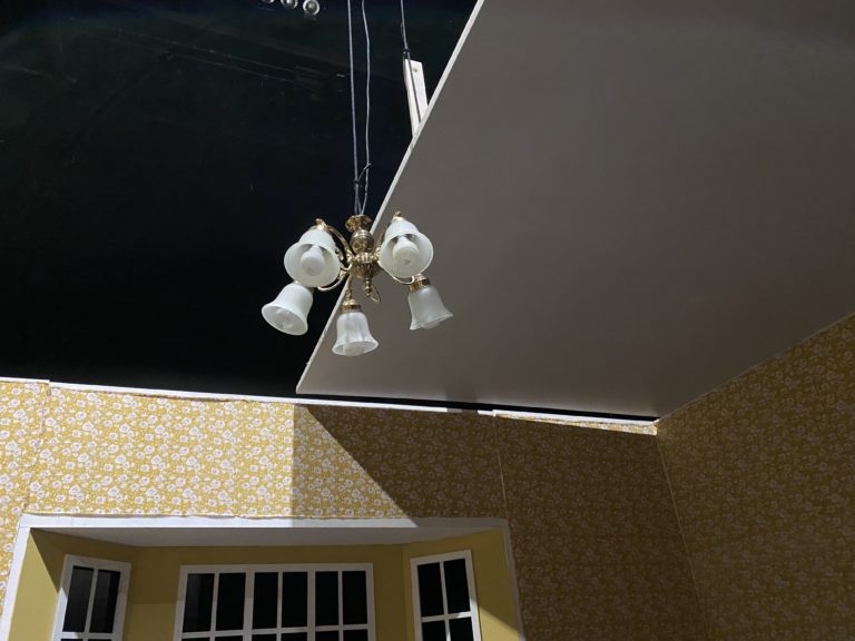 Ceiling and chandelier over living room